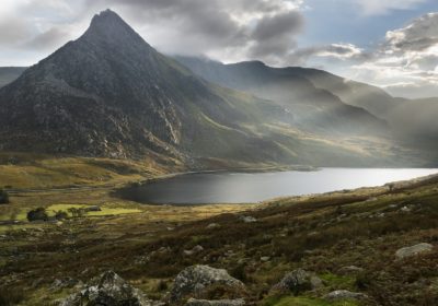 Tryfan and Llyn Ogwen lake in Snowdonia with crepuscular rays